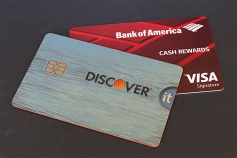Close Up Of A Bank Of America And A Discover Credit Card Editorial