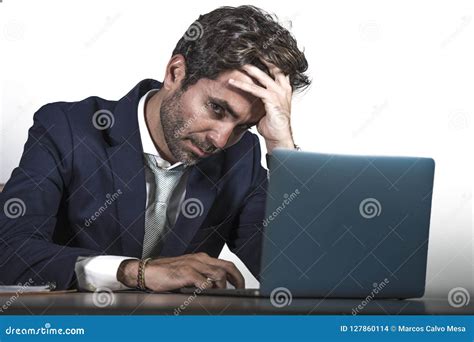 Young Sad And Depressed Business Man Working Overwhelmed And Frustrated