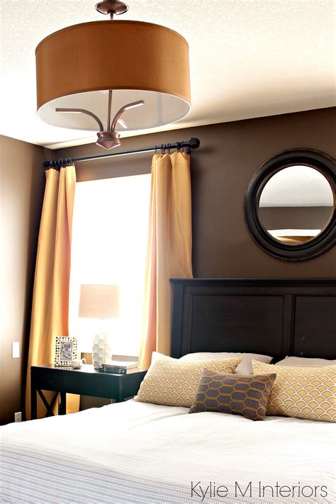 If you want to go dark with your bedroom design, these black bedroom ideas will help you. Bedroom painted Benjamin Moore Brown Horse, with gold ...
