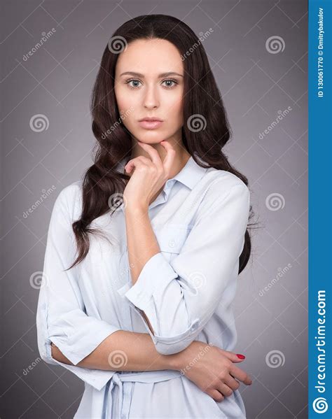 The Natural Beauty And Brooding Eyes Young Woman With Long Dark Hair