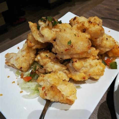The restaurant has a modern interior atmosphere and our cuisine varies between chinese, japanese, indian, with vegan and vegetarian meals. Fried squid #chinesefood #food #foodporn #restaurant # ...