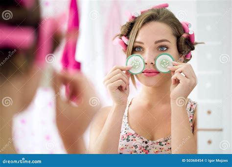 Eyes Treatment With Cucumber Stock Image 15143389