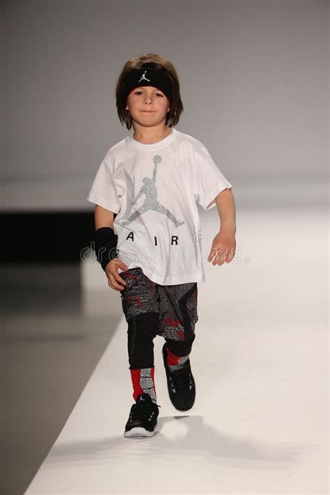 A Model Walks The Runway At The Nike Levi S Kids Fashion Show During