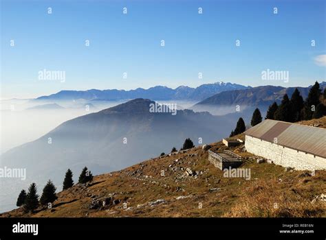 asiago plateau veneto pre alps italy on background the po valley immersed in the smog stock