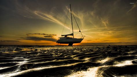 Sailboat On A Sunset Sandy Beach Wallpaper Photography Wallpapers