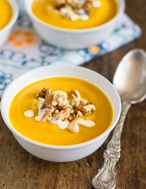 A totally delicious spiced squash soup, served with mega cheese on toast for dunking. Simple & Creamy Squash Soup Recipe - Pinch of Yum