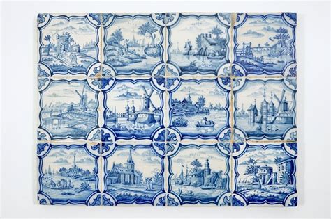A Field Of 12 Dutch Delft Blue And White Landscape Tiles 18th C