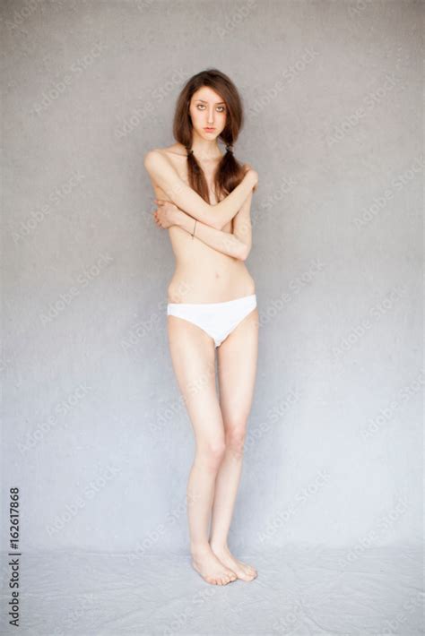 Girl Standing Partially Nude Stock Photo Adobe Stock