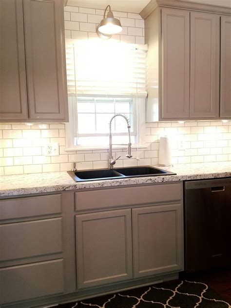 Find tile under kitchen cabinets here Grey Cabinets Black Sink White Subway Tile | Kitchen ...