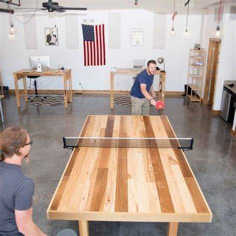 This ping pong table was made of plywood and 1×6 pieces of wood. Ping pong table made from reclaimed hardwood floors. DIY, custom made.: | Ping pong, Ping pong ...