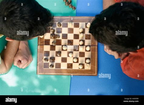 Young Men Playing Chess Stock Photo Alamy