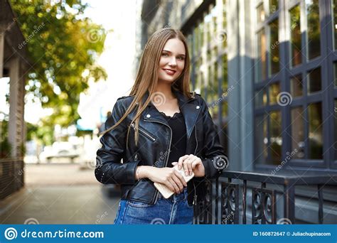 Face Portrait Of Attractive Woman In Black Leather Jacket Stock Image