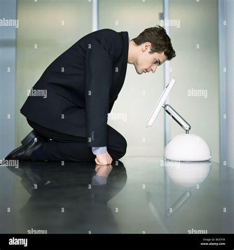 Man Kneeling Head Down Hi Res Stock Photography And Images Alamy