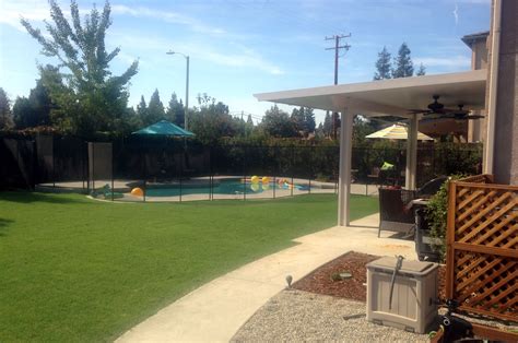 Outdoor Living Area With Child Pool Safety Features