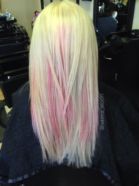Just be aware that putting red into pre lightened hair could cause bleeding onto your blonde tresses (meaning your blonde pieces can grab the red tone and turn slightly pink). Platinum blonde with pink highlights and soft, blended ...
