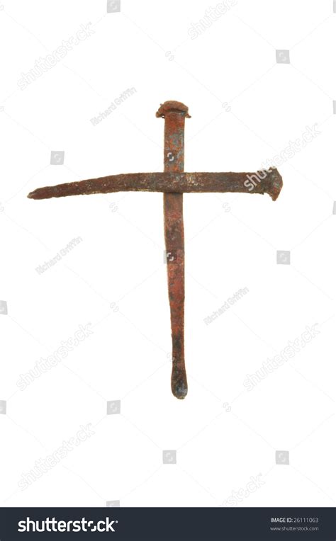 Two Hand Forged Antique Rusty Nails Form A Crucifix Stock Photo
