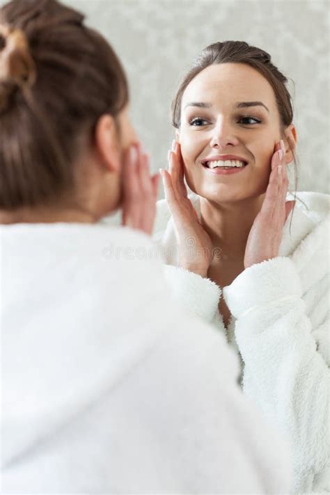 Woman Having A Stimulating Facial Treatment From A Therapist Stock