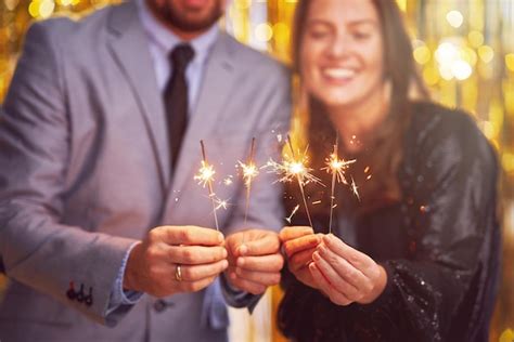 Premium Photo Couple At New Year Eve Party With 2023 Sparklers