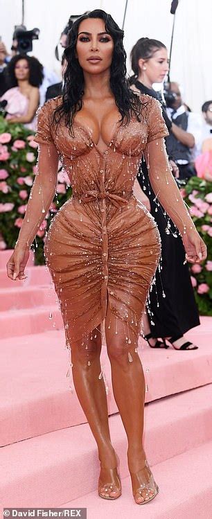 kim kardashian accentuates her hourglass curves in skintight caramel thierry