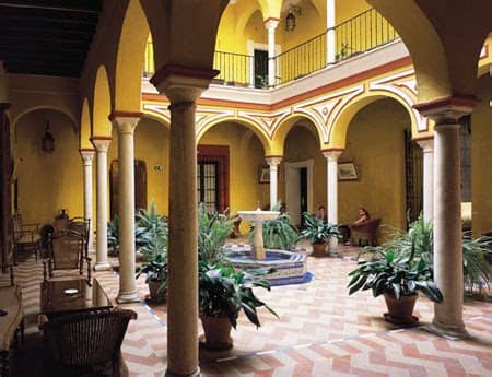 Las casas de la judería hotel in córdoba boasts a privileged setting as it opens its doors to overlook the jewish quarter, the xth century caliphate's baths, in the garden of campo santo de los mártires, right in front of the hotel; Hotel Casa de la Juderia, 4 star hotel in Seville