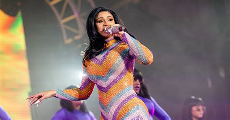cardi b rips her jumpsuit and flashes her behind while twerking at bonnaroo access