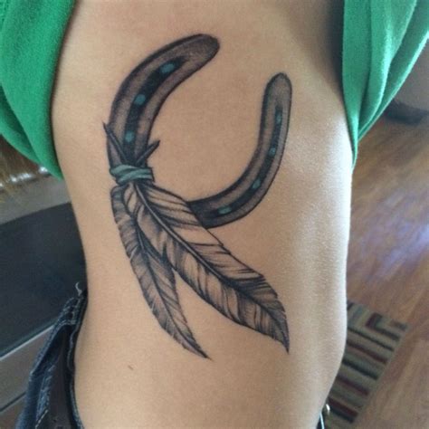 Horseshoe And Feather Tattoo Feather Tattoo Tattoos