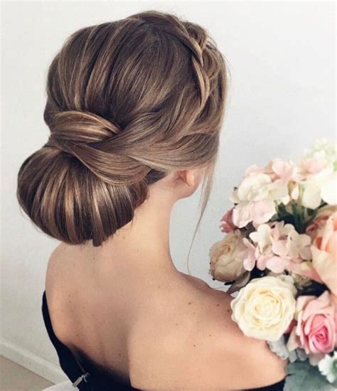 Maybe you would like to learn more about one of these? This elegant chignon wedding hairstyle perfect for any ...
