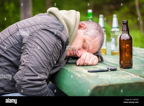 Drunk Men Sleeping On Table Stock Photo Alamy
