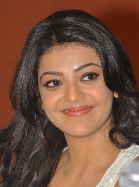 tollywood actress kajal aggarwal hot smiling face closeup in white top smile face oily face face