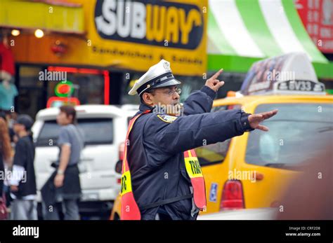 Traffic Policeman Of Nypd Directs Traffic Usa New York City