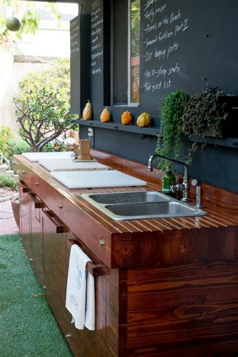 Example of a transitional kitchen pantry design in los angeles with shaker cabinets and white backsplash can this spice rack be on interior of upper cabinet. 15 Outdoor Kitchen Designs That You Can Help DIY