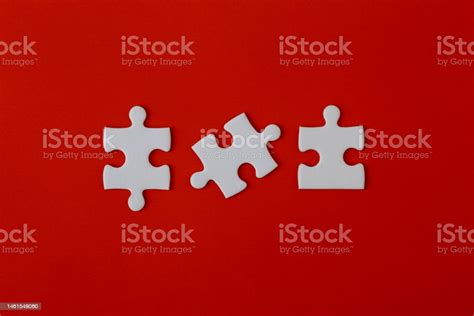 White Blank Puzzle Pieces On A Red Background Stock Photo Download