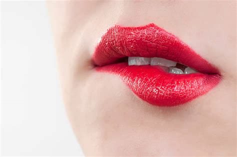 Royalty Free Close Up Woman Biting Her Red Lips Pictures Images And