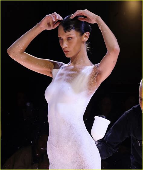 Bella Hadid Has Dress Spray Painted On Her Body During Coperni Show In