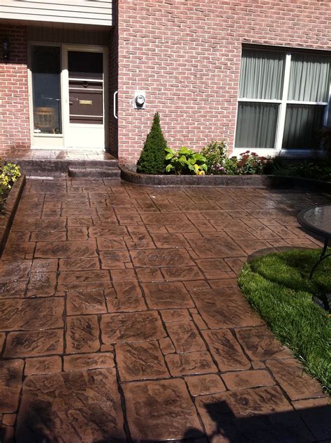 Is it something that you can repair, or do you need to hire a professional garage door repair service? English Yorkstone Stamped Concrete Patio in London Ontario