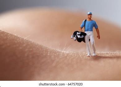 Miniature Figures Playing Golf On Naked Stock Photo Shutterstock