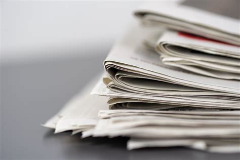 Folded Newspapers · Free Stock Photo