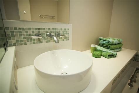 I sealed the area using sealer that i bought from home depot ( two layers). Circular bathroom sink with green blend glass tile ...