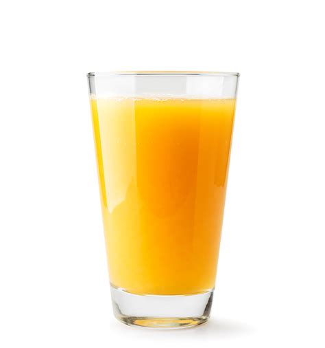 Orange Juice In A Glass Close Up On A White Isolated Waist Away