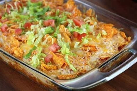 Spread the mixture evenly over the chips in the baking pan. Cheese Doritos Chicken Taco Casserole | KeepRecipes: Your ...