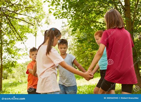 Friends Playing Ring Around The Rosy At Park Stock Image Image Of