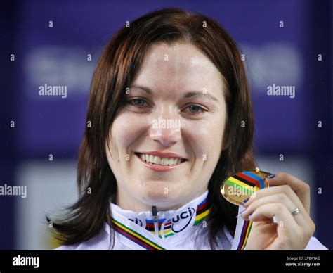 Australian Cyclist Anna Meares Poses With Her Gold Medal After Wining The Womens 500m Time