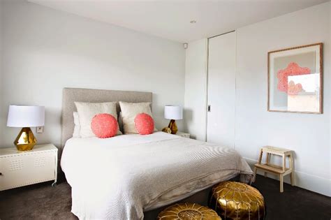 Girls bedroom designed in white and aqua blue featuring a window seat with white roman shades, a gray upholstered cushion and three shaker storage drawers with polished nickel pulls. White Bedroom Design With Peach And Gold Accents For Girls ...