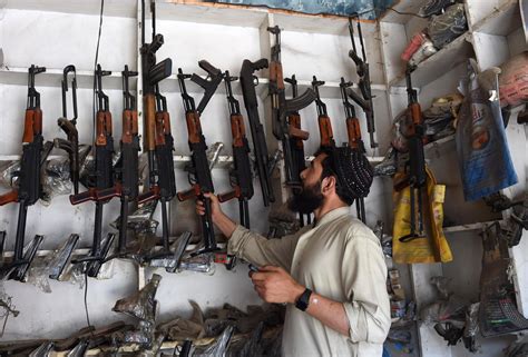Pakistan In Arms Bazaar Near Peshawar Kalashnikovs Are Cheaper Than