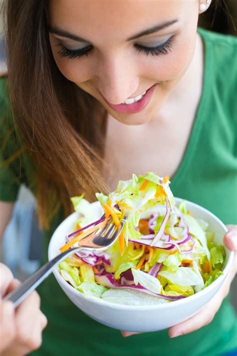 Woman Eating Salad Portrait Of Beautiful Smiling And Happy Caucasian