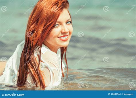 sensual girl wet cloth in water on the coast stock image image of redhair hair 72081961