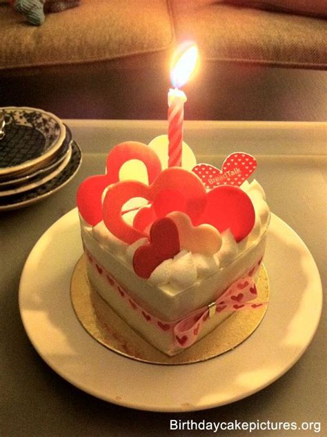 Beautiful birthday cake with burning candles and balloons. Birthday cake love with candle | Birthday Cake | Pinterest ...