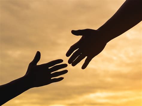 Closeup Helping Hands On The Sunset Sky Background Photo Premium Download