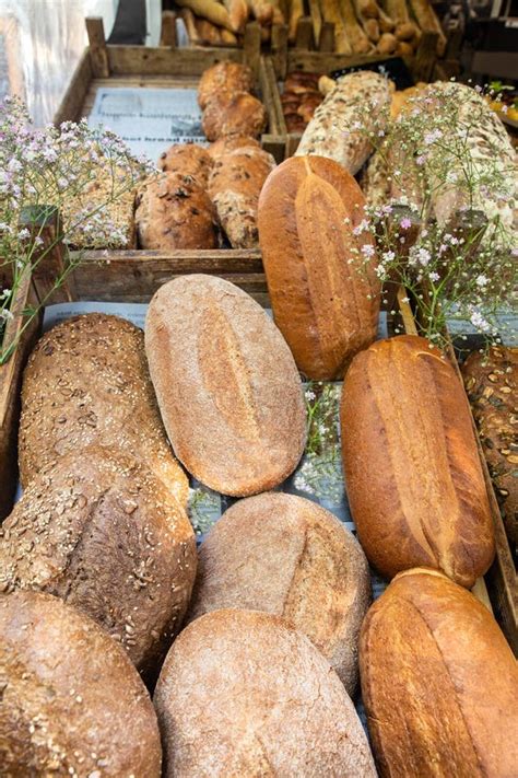 Fresh Loaves Of Bread On Display At Farmers Market Stock Photo Image