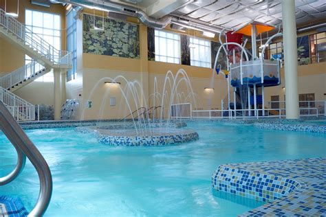 Large jacuzzi with tables and chairs for lounging. Municipal Pool Photos Wisconsin | National Commercial Pool ...